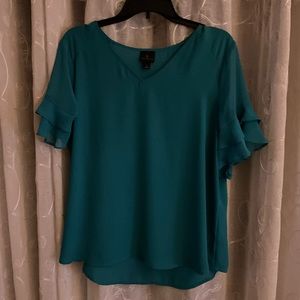 Easy-breeze flow teal blouse with little ruffles on the sleeves